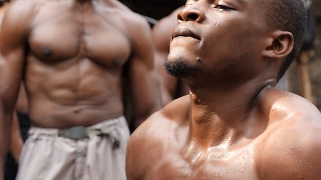 Karimah Ashadu, MUSCLE, 2025 (filmstill), Courtesy of the artist, Camden Art Centre, Fondazione In Between Art Film, The Renaissance Society, and Sadie Coles HQ, London